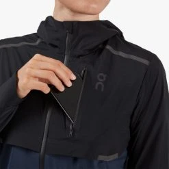 On Running Outerwear Women's Weather Jacket | Black/Navy 15 On Running Outerwear Women's Weather Jacket | Black/Navy